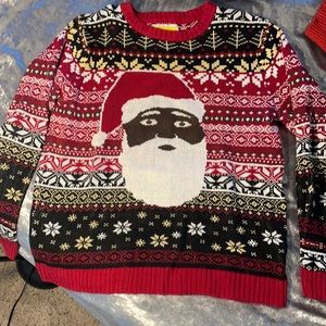 M tipsy elves sweater. Black Santa